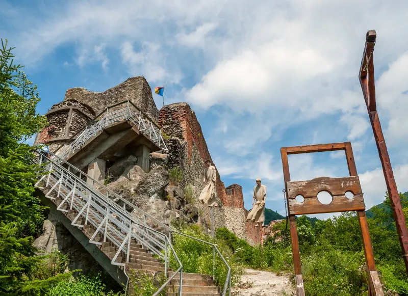 The metal stairs at the entrance to Poenari Fortress and its walls